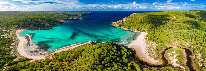 Obraz premium Aerial drone view of Menorca beach at cala de Algariens, Spain
