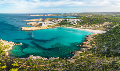 Fototapeta premium Areal drone view of Arenal de Son Saura beach at Menorca island, Spain