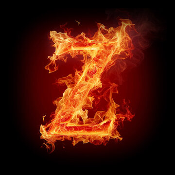 Letter Z made of fire flames with sparks isolated on black background