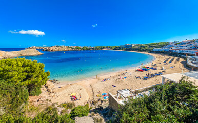 Areal drone view of the Arenal d'en Castell beach on Menorca island, Spain - 772506094