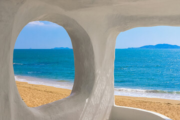 Beach at World's End Park, Sanya, China. View of the beautiful beach and sea from the white bungalow