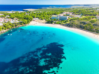 Areal drone view of the Arenal d'en Castell beach on Menorca island, Spain - 772512285