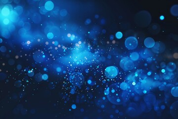 Blue bokeh background with glittering lights and shimmering particles, creating a festive and...