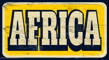 Old worn retro Africa sign on wood
