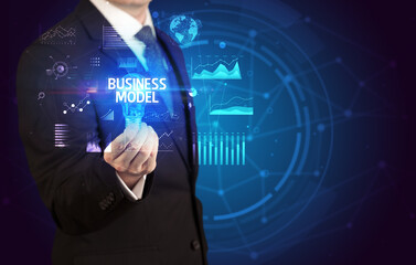 Businessman holding a light bulb, new business concept