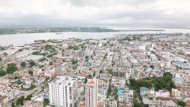 Areal Tracking shot of African coastal industrial port City town Cloudy day Mombasa County, Kenya