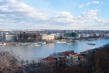 Obraz premium Aerial view on Danube River and buildings in City center of Budapest, Hungary. Drone photo, high angle view of town