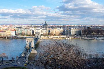 Fototapeta premium Aerial view on Danube River and buildings in City center of Budapest, Hungary. Drone photo, high angle view of town