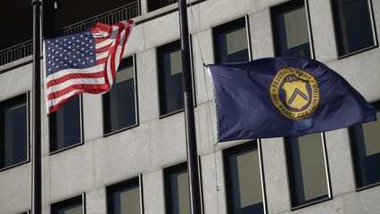Flags in front of Federal Deposit Insurance Corporation building in Washington, DC. - obrazy, fototapety, plakaty