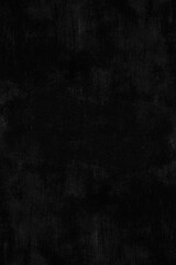 Black Painted Grunge Texture. Black Rough Background with Stains and Streaks From the Brushstroke, No text. Dark Textured Hand Painted Surface. Black Abstract Layout.