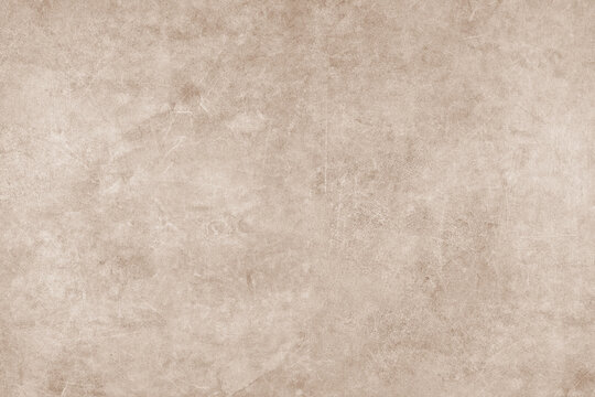 Painted brown grungy concrete background texture. Abstract wallpaper, shabby stone wall, vintage stucco surface, studio backdrop