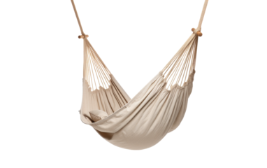 A serene white hammock gently sways from a sturdy rope, inviting relaxation and escape into a dreamlike oasis