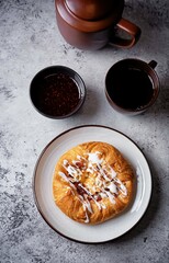 Puffed cake with raspberry jam, vanilla custard cream and almonds