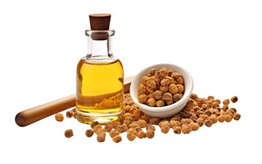 A bottle of oil stands elegantly next to a bowl of peanuts, creating a tempting culinary duo