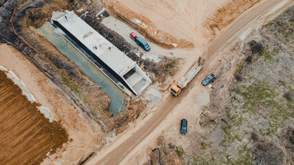 Aerial view of an industrial area, Heavy Equipment Machine On Field, Soil Compactor. Road...