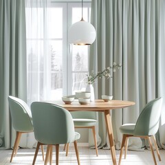 Cozy mint chairs at a round wooden dining table with modern pendant light