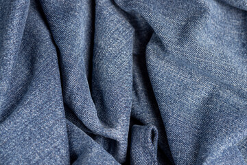 Fototapeta premium details of clothes made of blue denim soft fabric