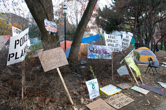 Signs in the downtown Toronto parks tent city