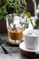 Vietnamese phin milk coffee in the glass - 772591213