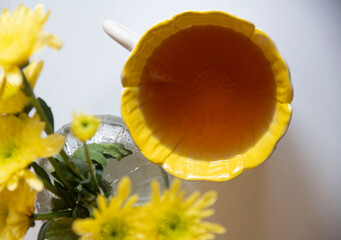yellow tea cup