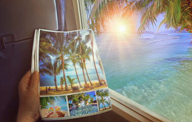 Airplane window with beautiful views of turquoise clear sea, palm trees, bright sunrise.Woman sitting by the window on an airplane and looking at an advertisement page in a magazine.Travel concept art