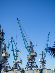 Fototapeta na wymiar Marine cranes. Loading heavy loads.
