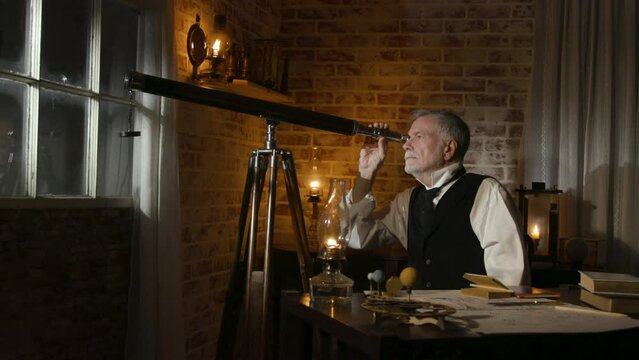 Victorian astronomer looks through his telescope