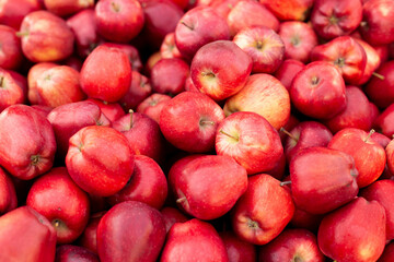 Fresh ripe red apples as background