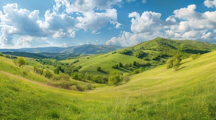 Obraz premium panorama of beautiful countryside of romania. sunny afternoon. wonderful springtime landscape in mountains.