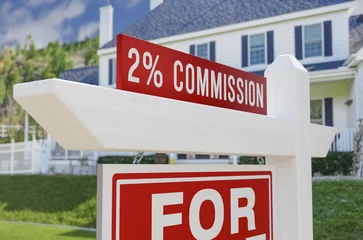 Zelfklevend Fotobehang 2% Commission For Sale Real Estate Sign In Front Of New House. © Andy Dean