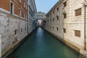 Fototapete Seufzerbrücke Small canal passing towards famous Bridge of Sighs or Ponte dei Sospiri, Venice, Veneto, Italy