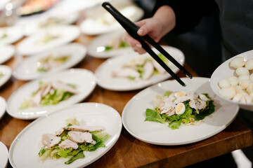 cooking dozens of servings of caesar salad