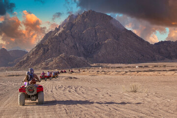 Experience a Desert Quad Biking Adventure at Sunrise, close to Sharm el Sheikh.