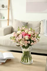 Gardinen Beautiful bouquet of fresh flowers in vase on wooden table indoors © New Africa