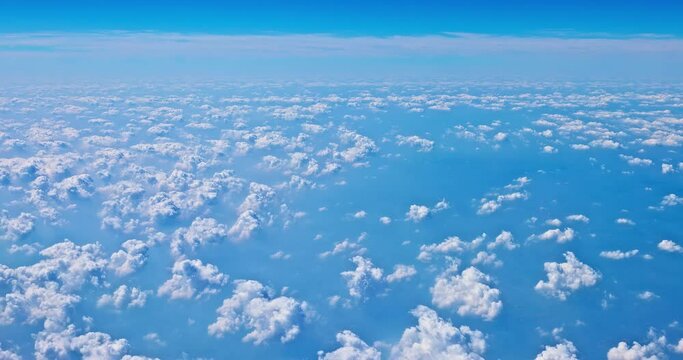 Aerial panning shot of clouds in the stratosphere