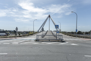 Image of the metal structure of a small bridge for road traffic and pedestrians, with signage...