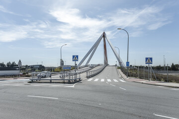 Image of the metal structure of a small bridge for road traffic and pedestrians, with indicative...