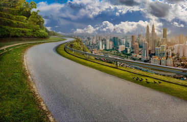 Contrast of Nature and Urban Skyline in Kuala Lumpur at Golden Hour