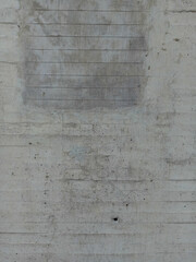 Grey rough tiled concrete wall with holes background texture, Cement floor texture, grunge and dirty. For composing