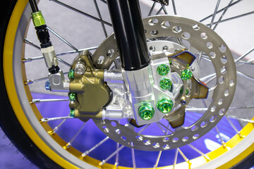 Disc brakes on a motorcycle up close alloy wheels for motorcycles robust steel wheel arches. Tires...