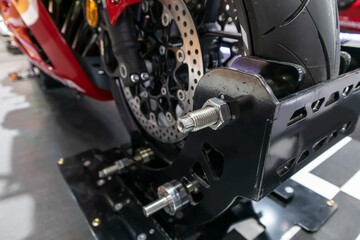 Disc brakes on a motorcycle up close alloy wheels for motorcycles robust steel wheel arches. Tires and wheels for motorcycles in chrome. ABS on motorbikes and disc brakes are safety devices.