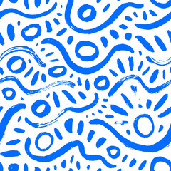 Abstract hand drawn blue wavy lines and circles seamless pattern. Doodle childish background with brush drawn strokes and lines.