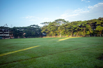 Empty football field with in the morning in the countryside