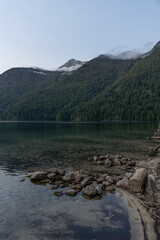 Beautiful waters of the Chilliwack Lake park clouds and mountains