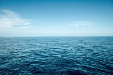 Fototapeta premium A tranquil background of a distant horizon at sea where the water meets the sky in perfect harmony