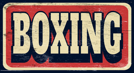 Aged vintage boxing sign on wood