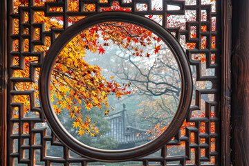 Beautiful autumn foliage view through the windows from a traditional wooden Chinese house