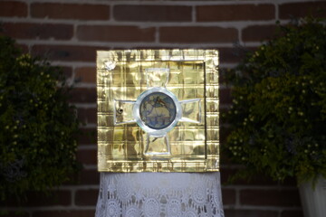 catholic relic in golden box in the altar of a church