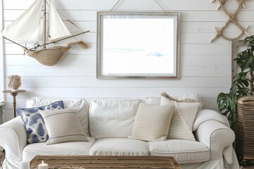 White couch in a living room with sailboat wall decor - obrazy, fototapety, plakaty