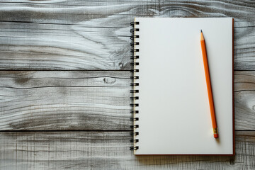 Blank Spiral Notebook with Pencil on Wooden Background. Open Notebook and Green Pencil on Textured Wood Table